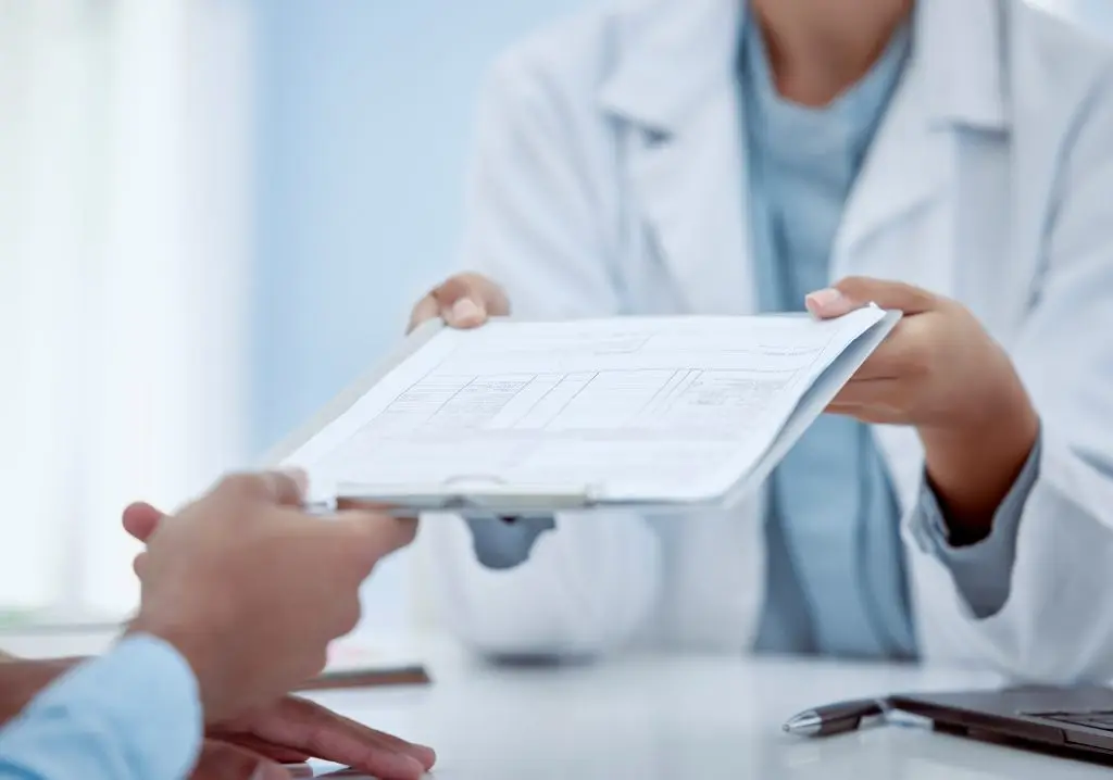 A medical record being given
